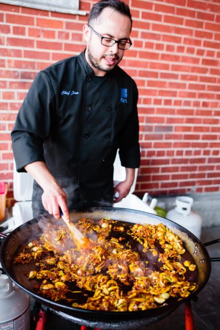 Chef cooking paella