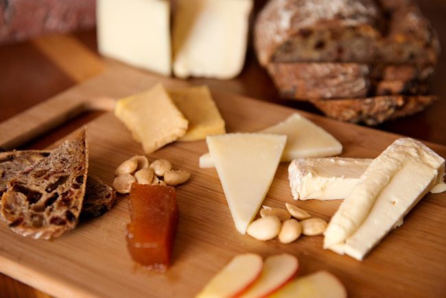 Spanish cheeses on wood board