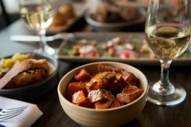Patatas bravas with wine