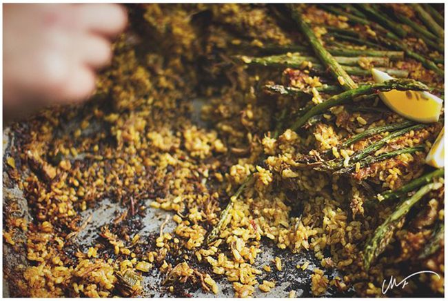 Scraping the paella pan