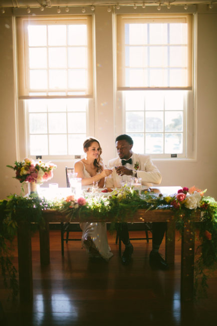 Bride and groom toasting