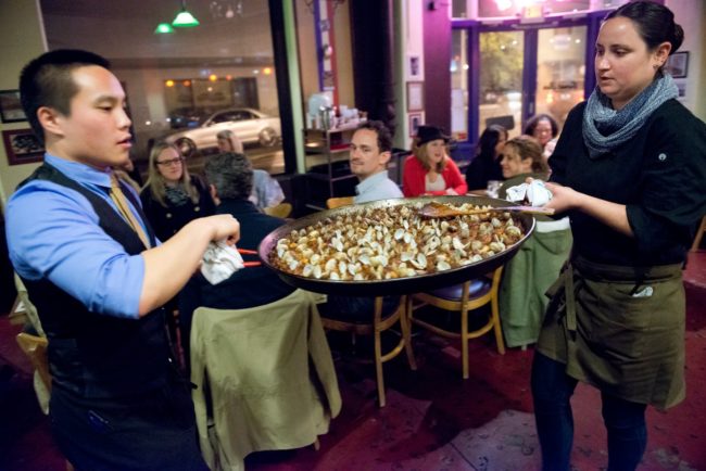Serving fresh paella